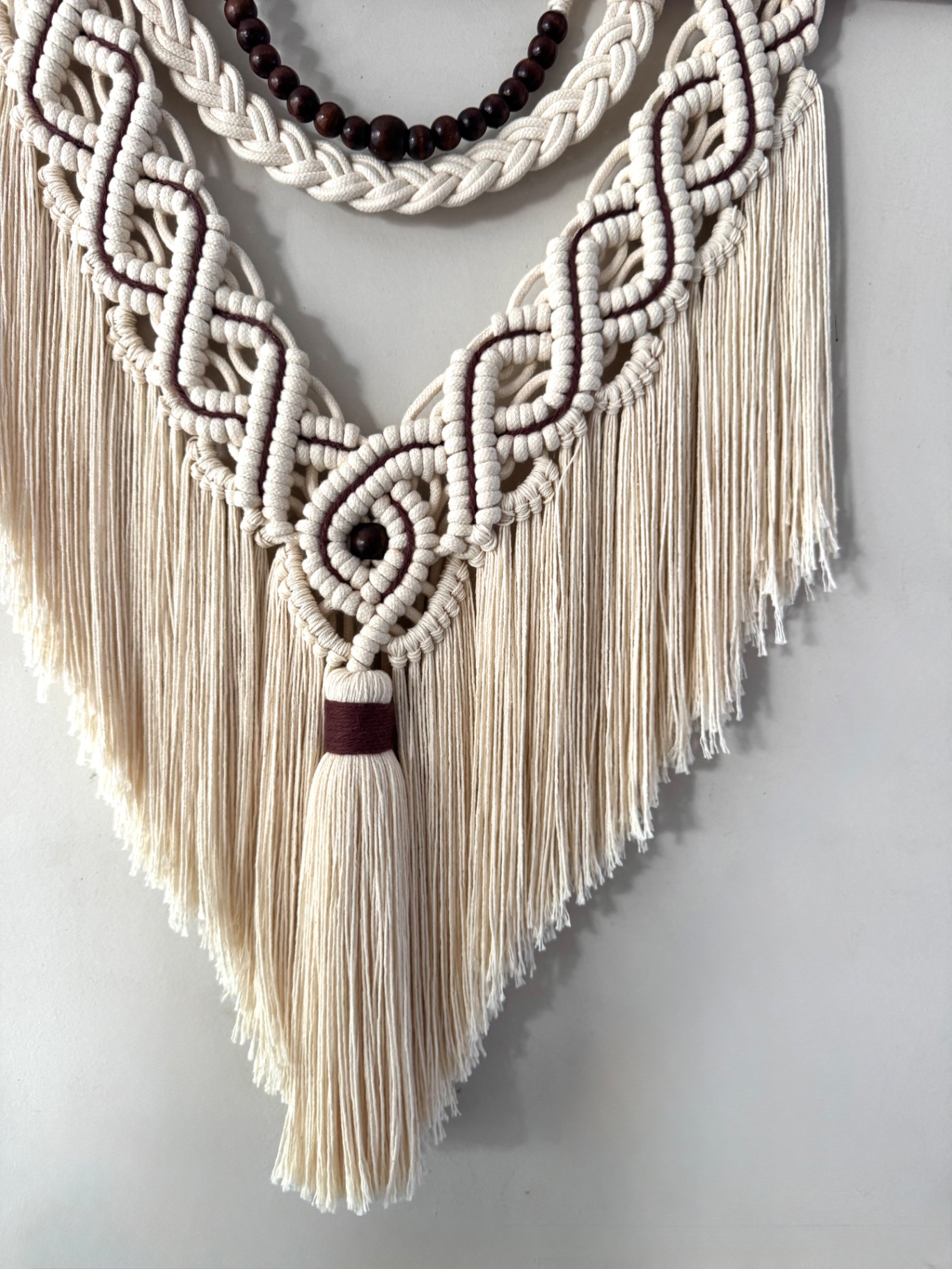 Detalhe do miolo central — tassel MAHAI